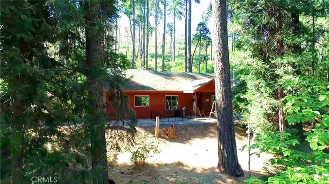 a view of a small yard from a balcony