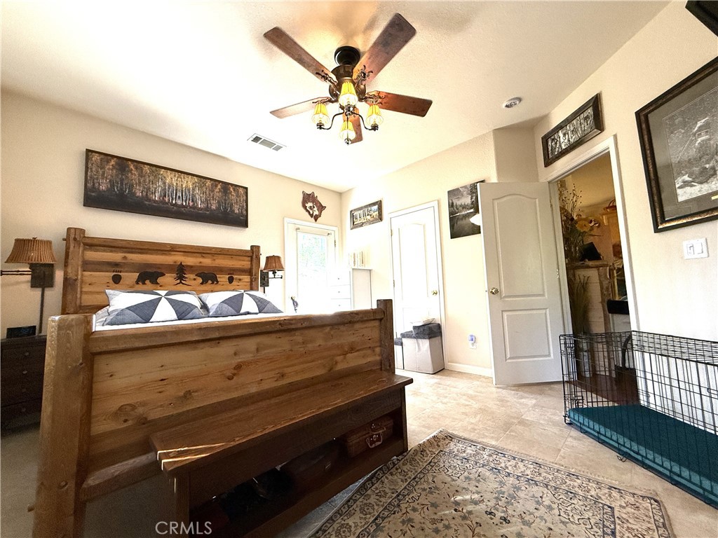 3502 Comet Mine Mariposa, CA 95338 - Photo 33 of 47 a view of bedroom with furniture and wooden floor