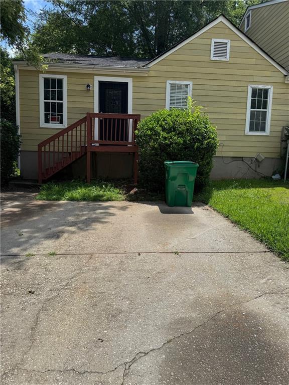 a front view of a house with yard