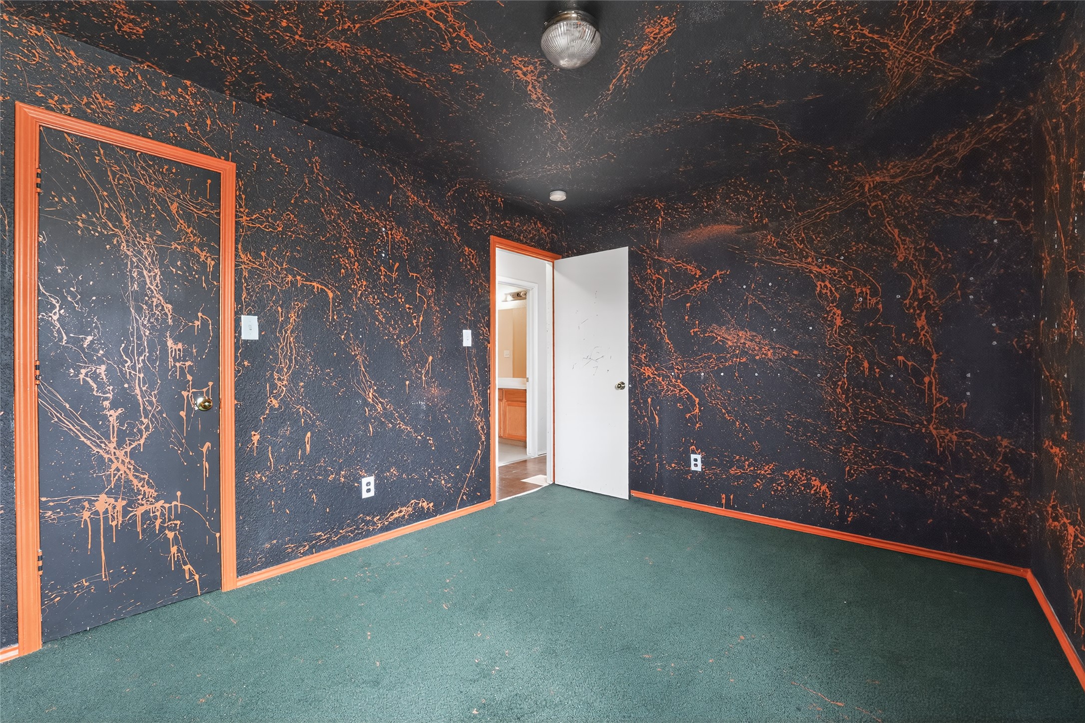 152 Eagle Drive Luling, TX 78648 - Photo 16 of 31 Carpeted empty room featuring wallpapered walls