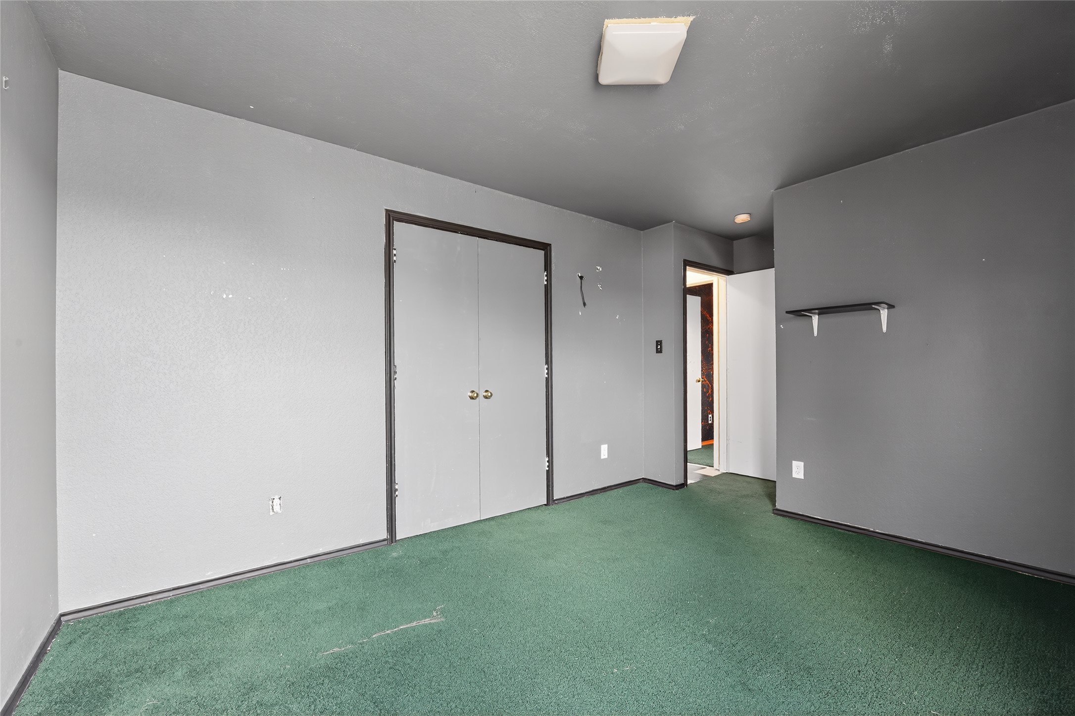 152 Eagle Drive Luling, TX 78648 - Photo 26 of 31 Unfurnished bedroom featuring carpet and a closet