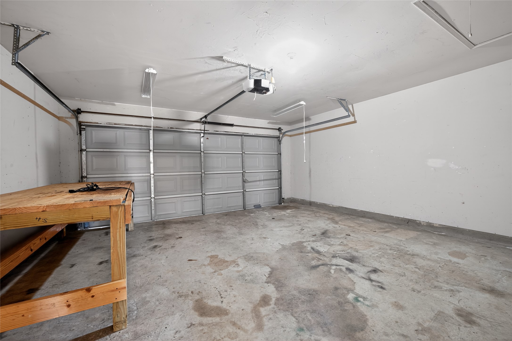 152 Eagle Drive Luling, TX 78648 - Photo 28 of 31 Garage with a garage door opener