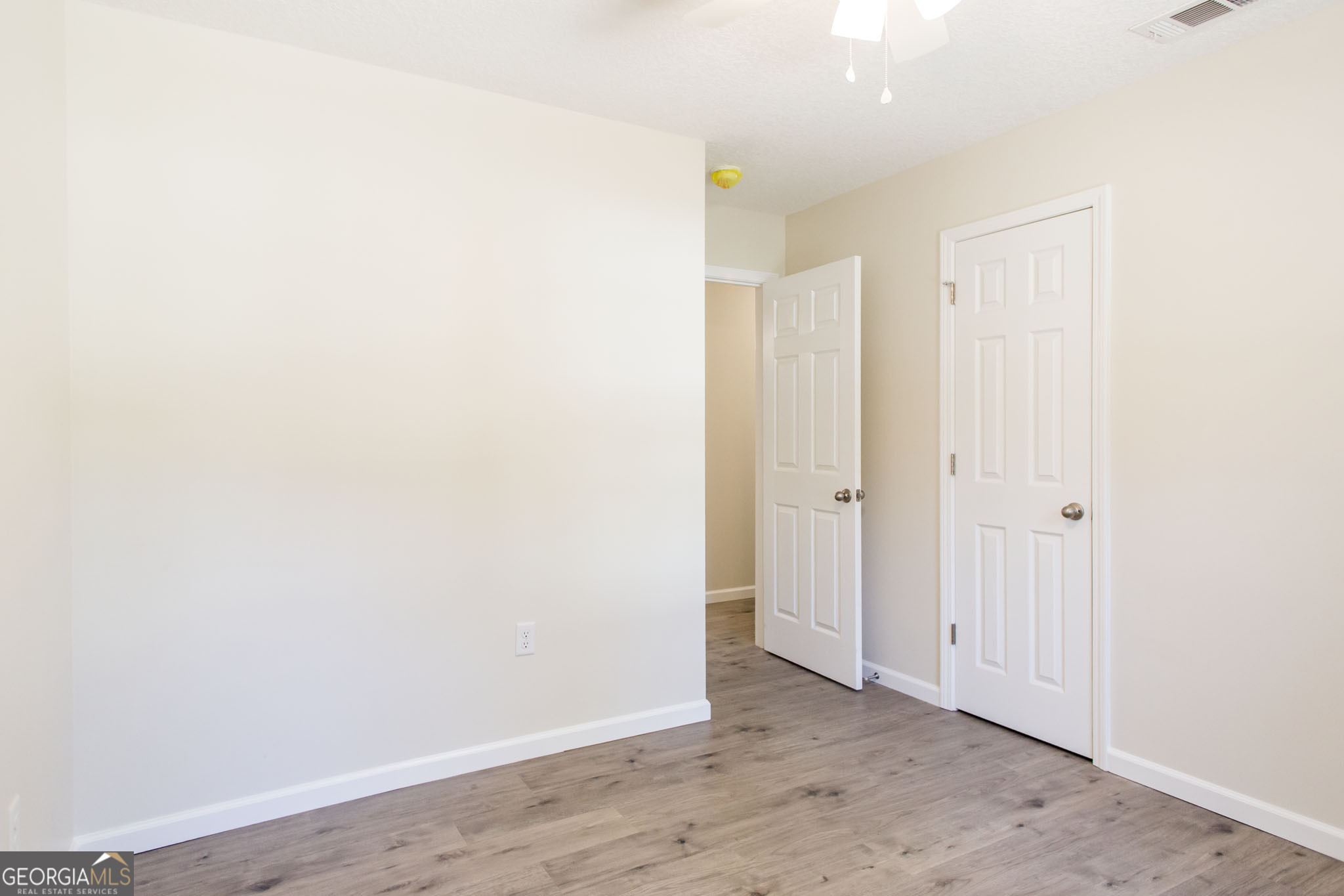 121 Union Street Waycross, GA 31501 - Photo 18 of 25 a view of an empty room