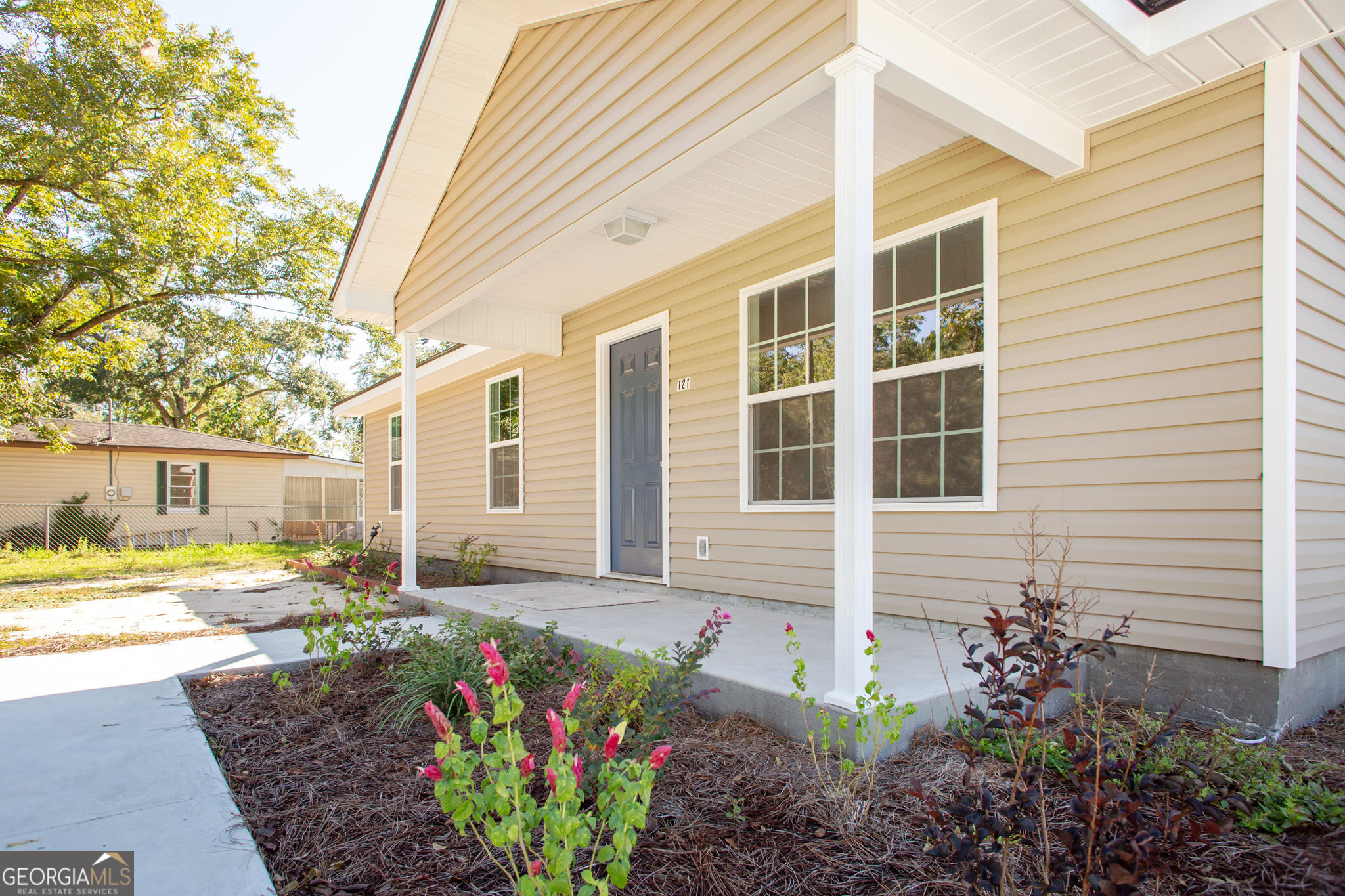 121 Union Street Waycross, GA 31501 - Photo 24 of 25 a front view of a house with garden