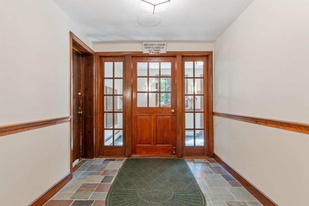 420 Great Road, Unit C1 Acton, MA 01720 - Photo 25 of 29 a view of an empty room with a window