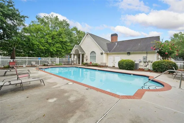 a picture of a bathroom with a shower