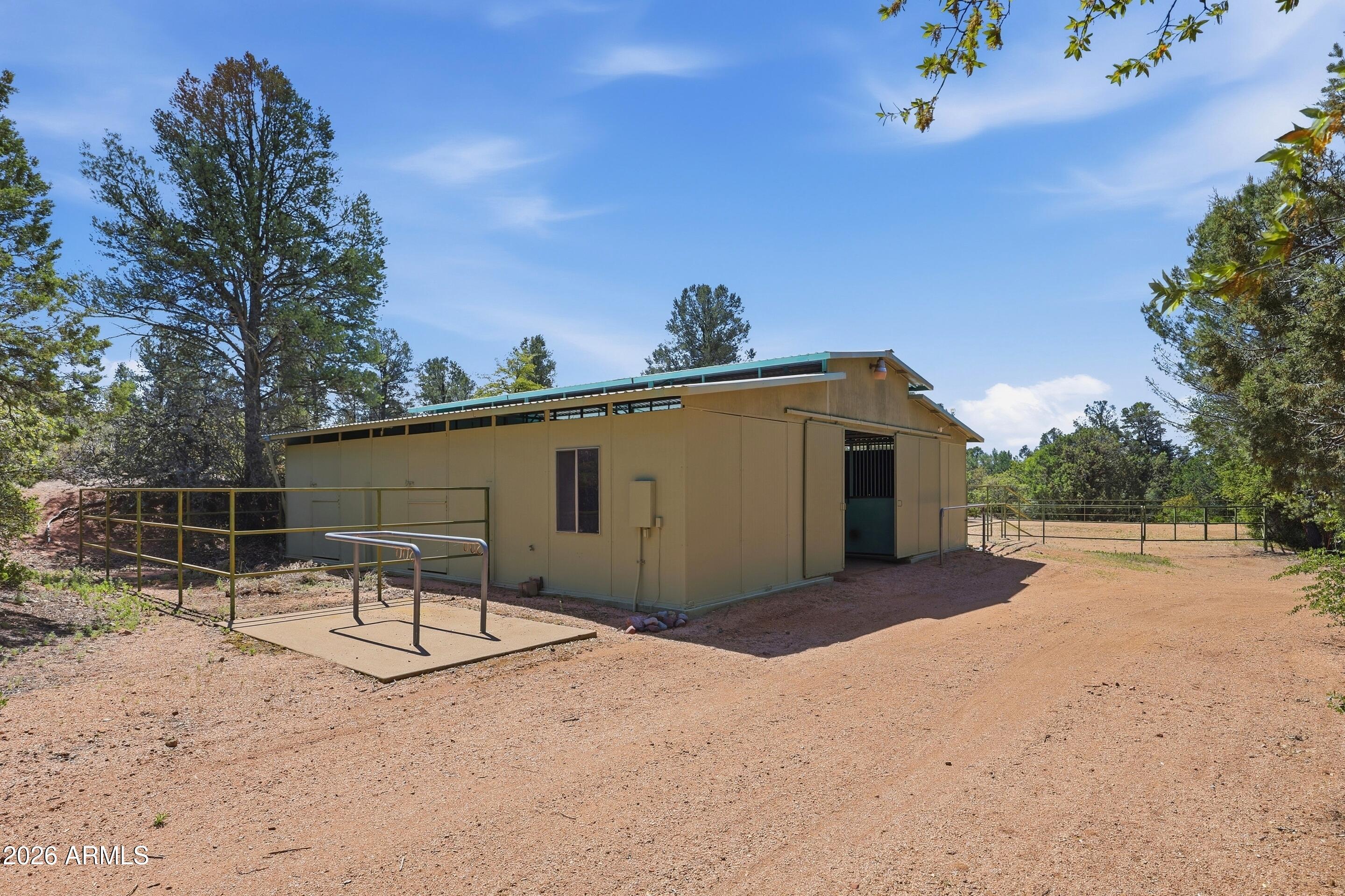 1405 East Graham Rnch Trail Payson, AZ 85541 - Photo 33 of 46 a backyard of a house with table and chairs