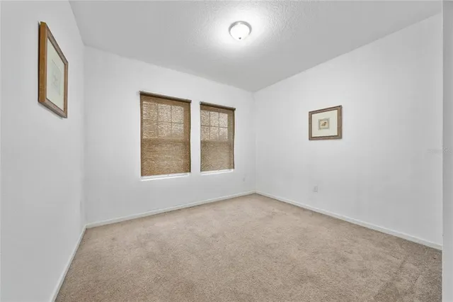 an empty room with a hallway