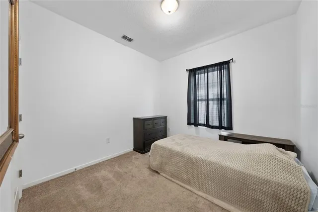 a view of a room with a wardrobe space