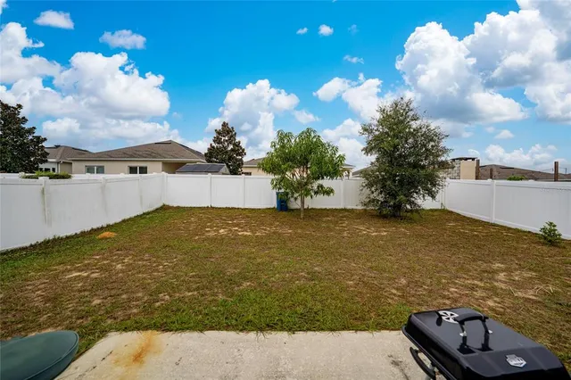 a view of a backyard with a garden