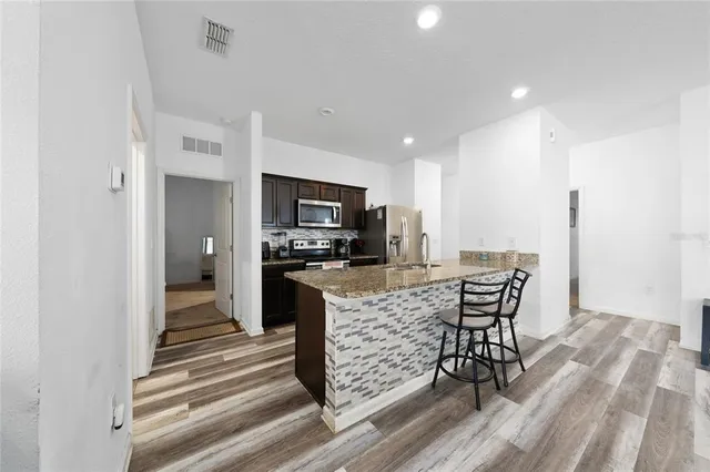 a view of a dining room with furniture