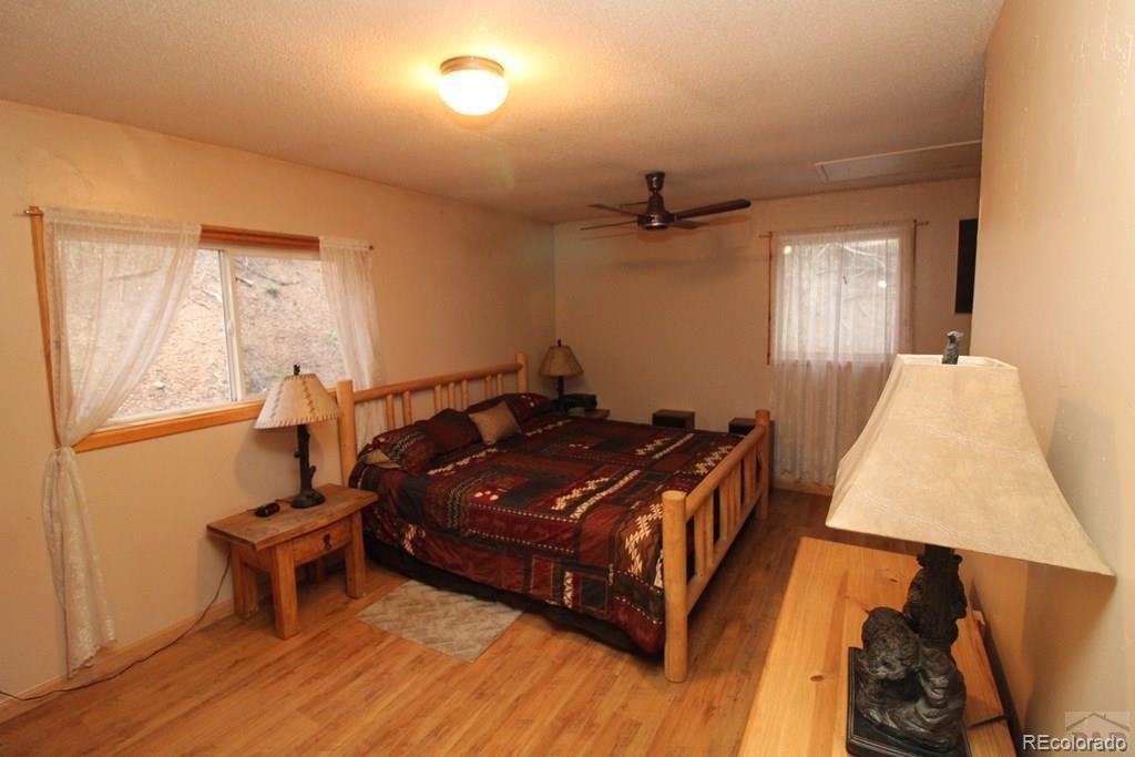 148 County Road 378, Unit 378 Rye, CO 81069 - Photo 8 of 35 a room with a bed and a window