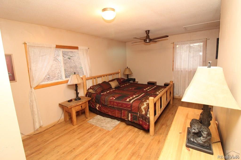 148 County Road 378, Unit 378 Rye, CO 81069 - Photo 9 of 35 a room with a bed and a table