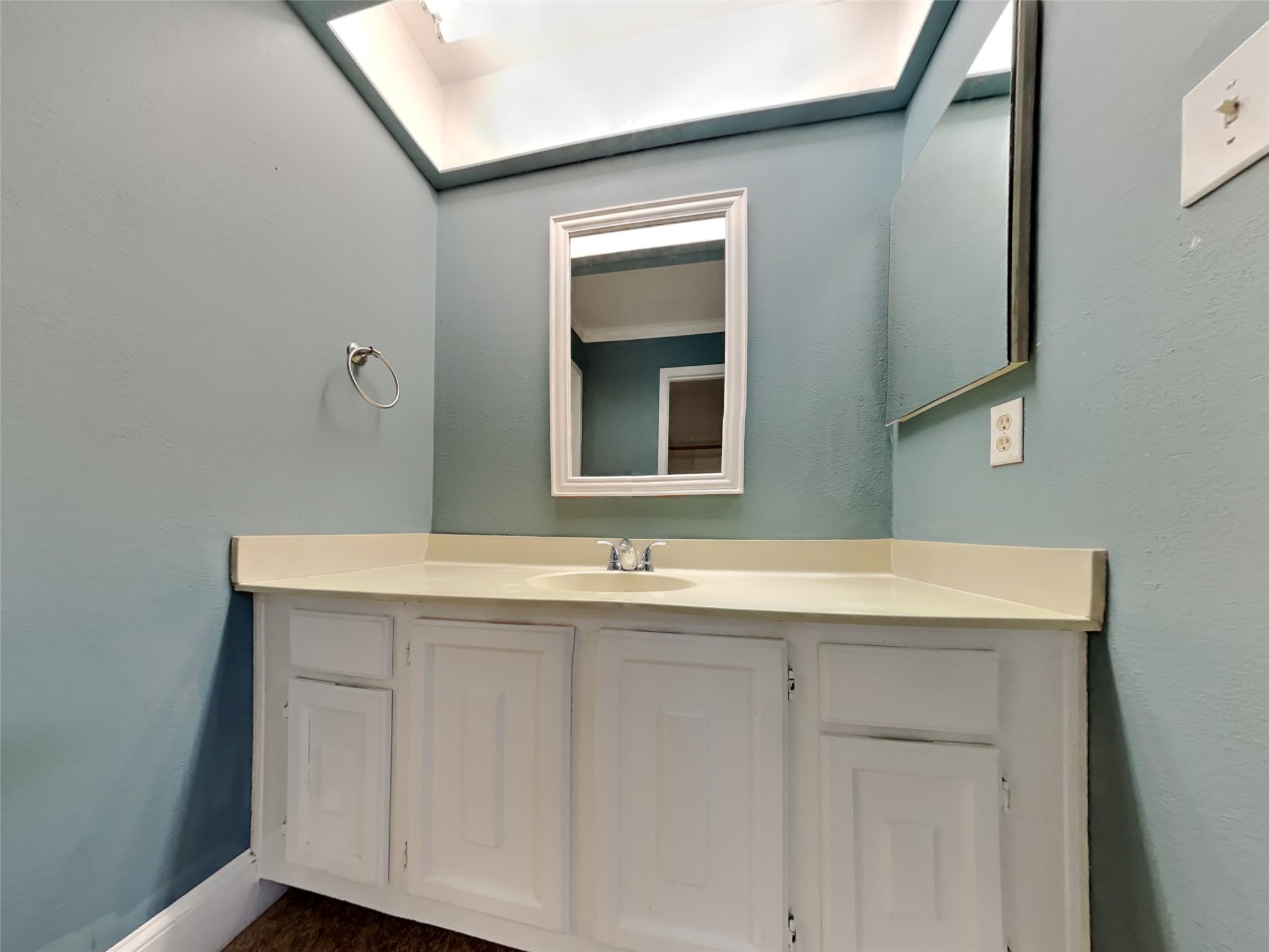 3910 Cedar Forest Drive Houston, TX 77339 - Photo 16 of 21 a bathroom with a sink and a mirror