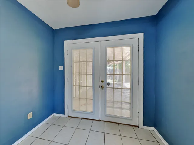 a view of an empty room with window