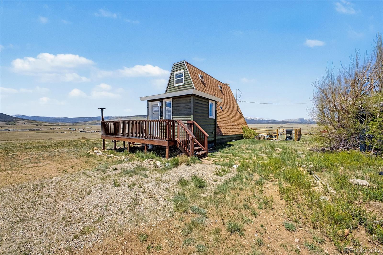 1365 Kokanee Road Fairplay, CO 80440 - Photo 2 of 45 a house view with a garden space