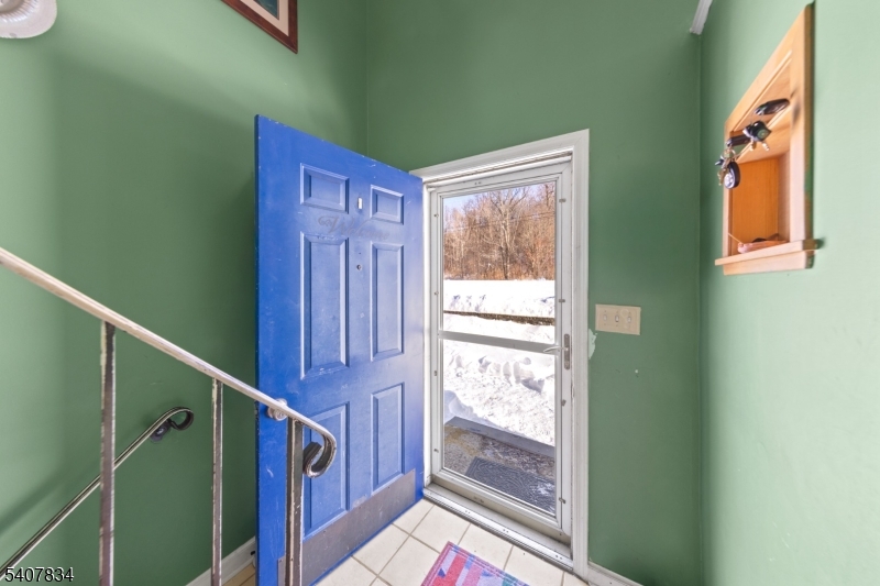 31 Meadow Lane Vernon, NJ 07462 - Photo 23 of 43 a view of front door with small stairs
