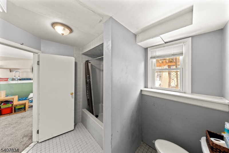 31 Meadow Lane Vernon, NJ 07462 - Photo 28 of 43 a bathroom with a toilet and a shower