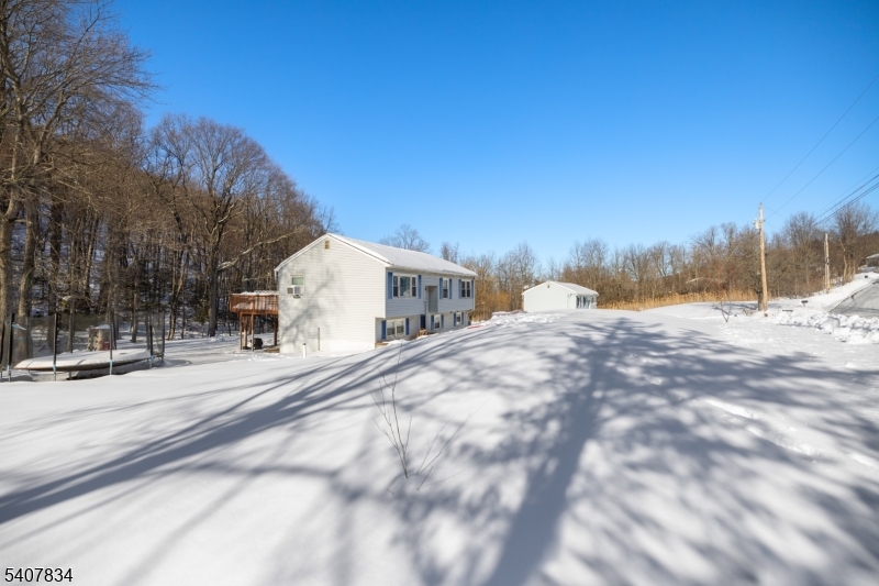 31 Meadow Lane Vernon, NJ 07462 - Photo 6 of 43 a view of back yard of the house