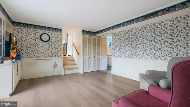 a bathroom with a sink a mirror and a toilet