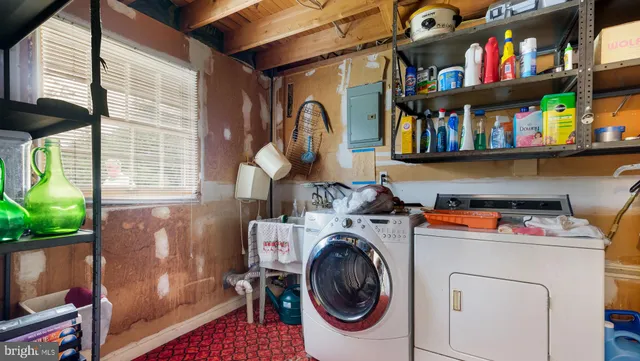 a view of a roof deck with wooden floor and fence