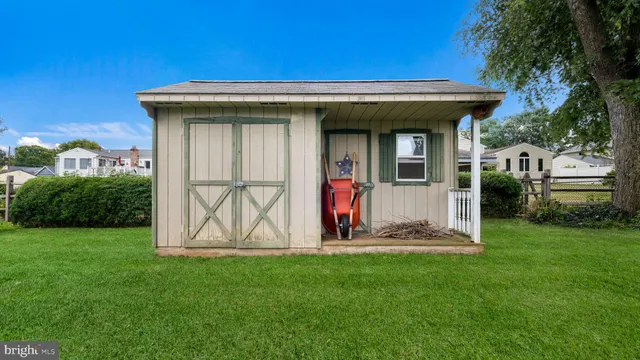 a park with slide and trees