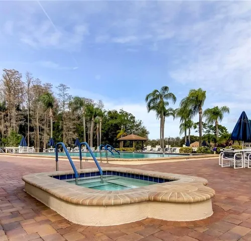 a view of an outdoor space and tennis court