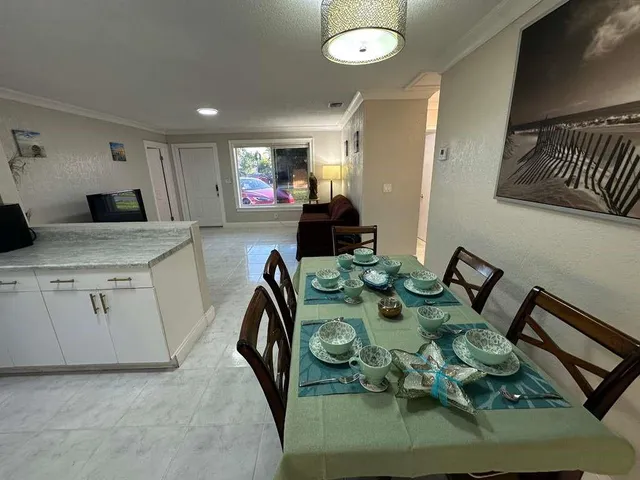 a view of a dining room with furniture
