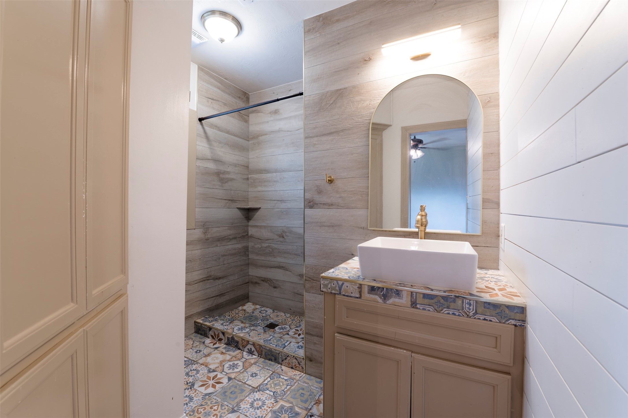 4303 Castor Street Houston, TX 77022 - Photo 18 of 41 a bathroom with a sink and a mirror