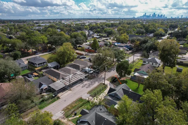 an aerial view of residential house with outdoor space
