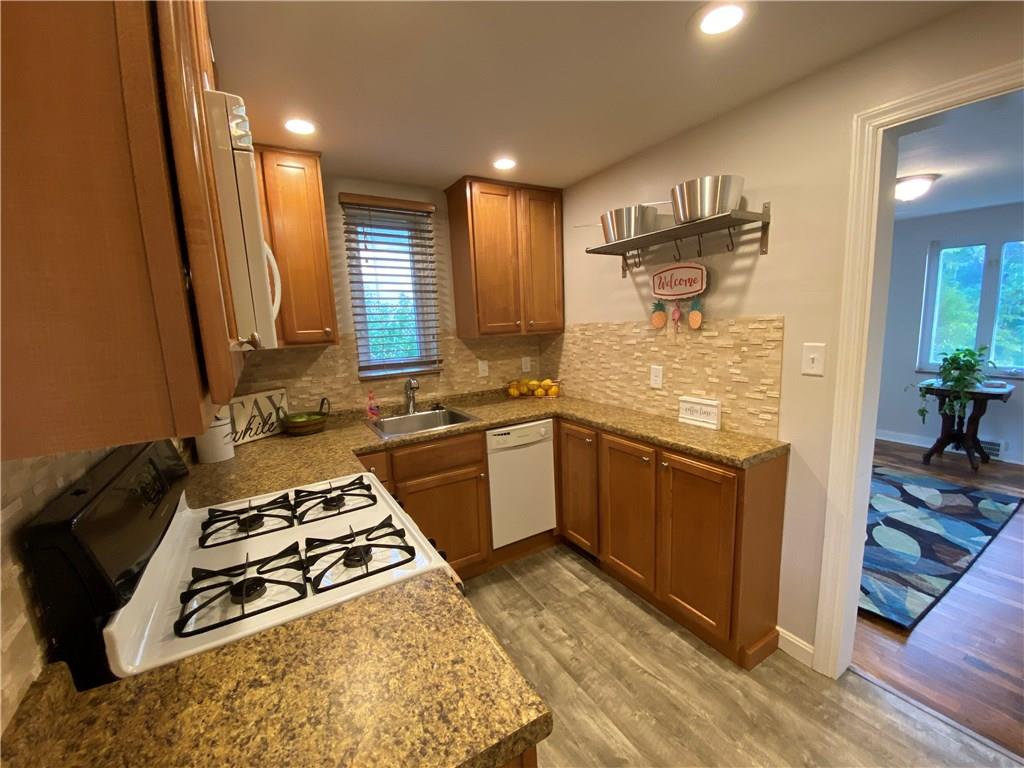 615 Kelso Road Pittsburgh, PA 15243 - Photo 9 of 25 All appliances included-microwave, gas stove, dishwasher, and even the pot hanger!