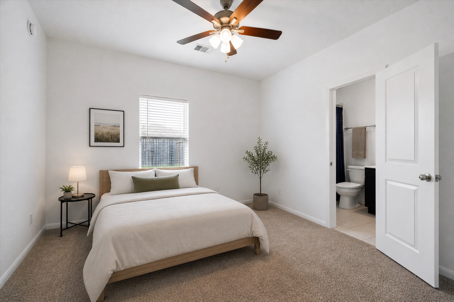3354 Harmony View Lane Spring, TX 77386 - Photo 9 of 18 a bedroom with a bed and a potted plant