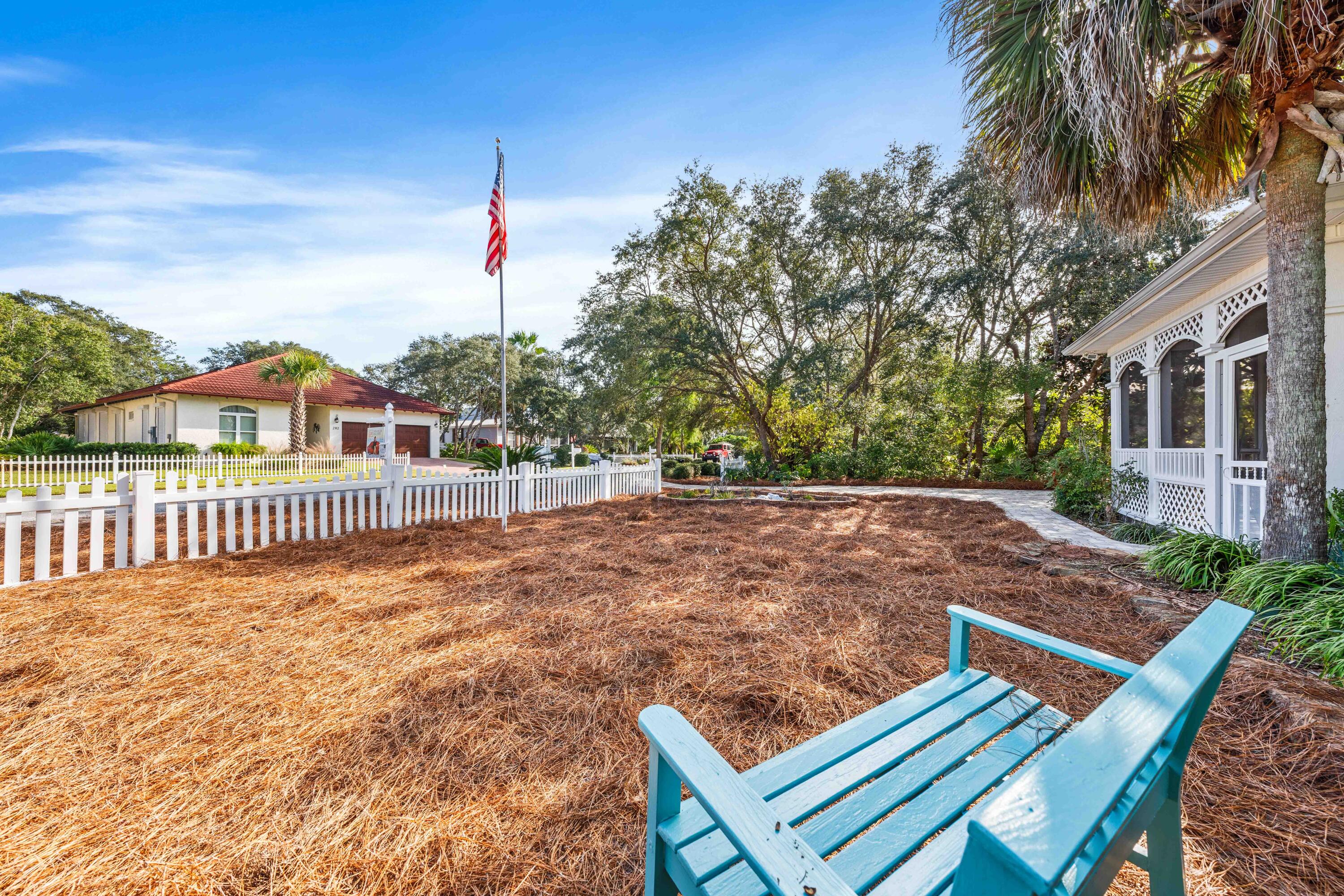 281 Seabreeze Circle Inlet Beach, FL 32461 - Photo 6 of 34 front yard w/ flag