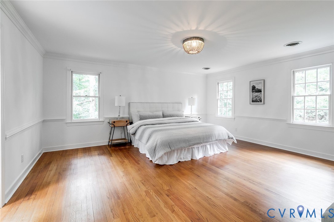 3911 Reeds Landing Circle Midlothian, VA 23113 - Photo 24 of 53 Spacious primary bedroom featuring hardwood floori