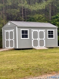 9425 Marie Road New Kent, VA 23124 - Photo 17 of 55 a view of a house with a yard