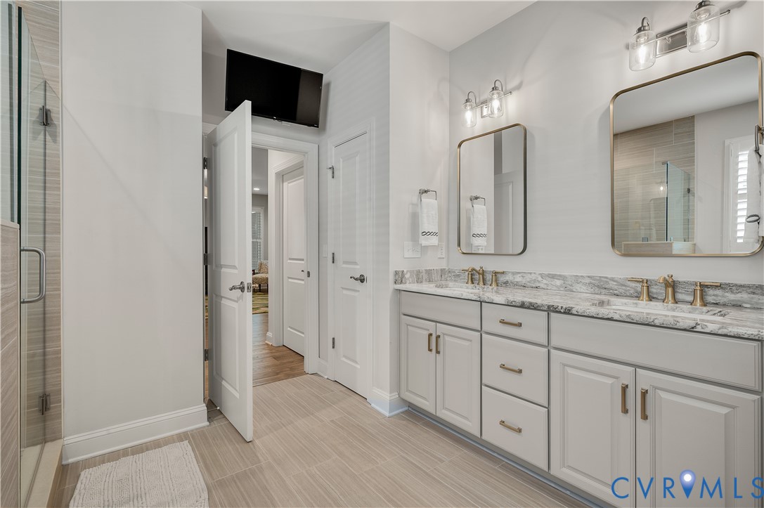 9419 Widthby Road Chesterfield, VA 23832 - Photo 30 of 40 Double vanity, linen closet