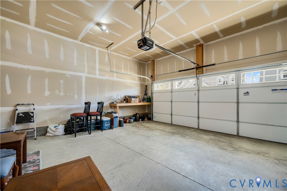 9419 Widthby Road Chesterfield, VA 23832 - Photo 5 of 40 Garage featuring a garage door opener