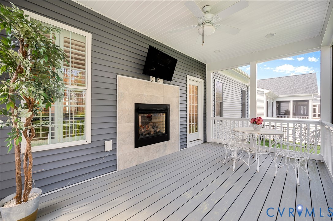 9419 Widthby Road Chesterfield, VA 23832 - Photo 10 of 40 Screened porch with a Gas fireplace, ceiling fan,