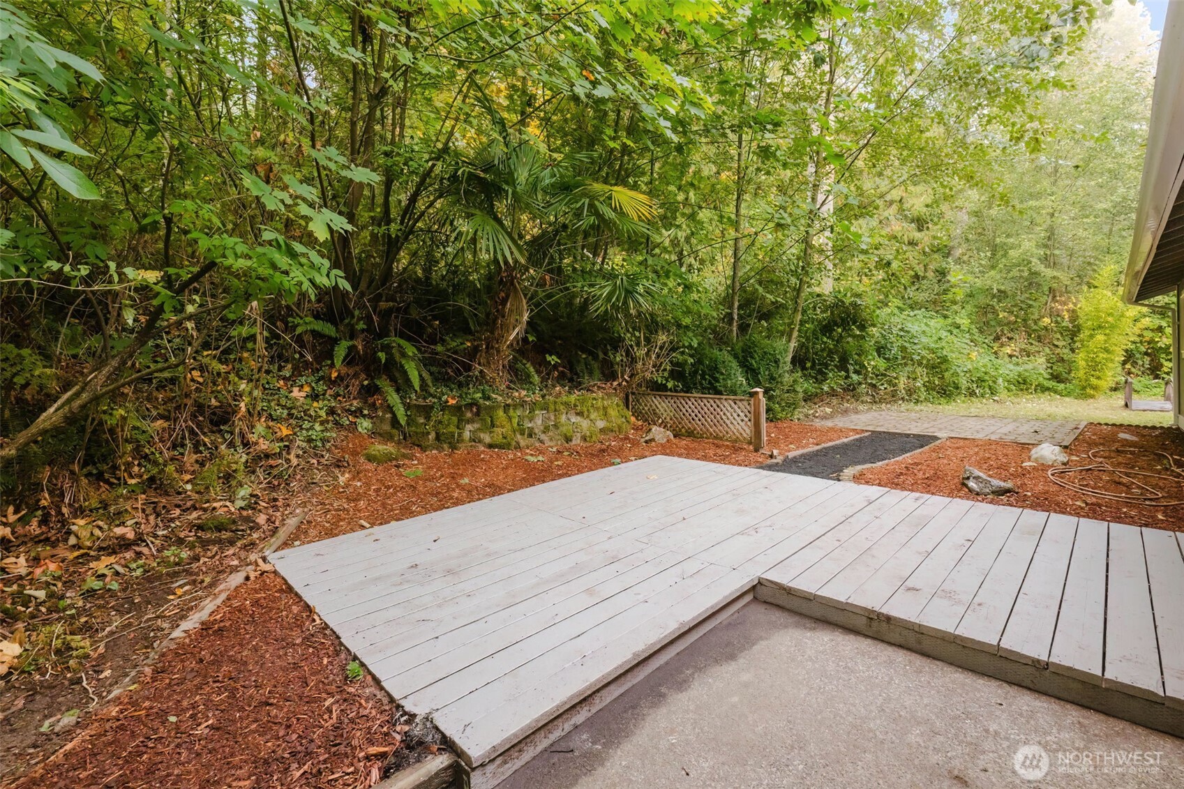 80 East Judy Lane Belfair, WA 98528 - Photo 11 of 40 a view of a backyard with wooden fence