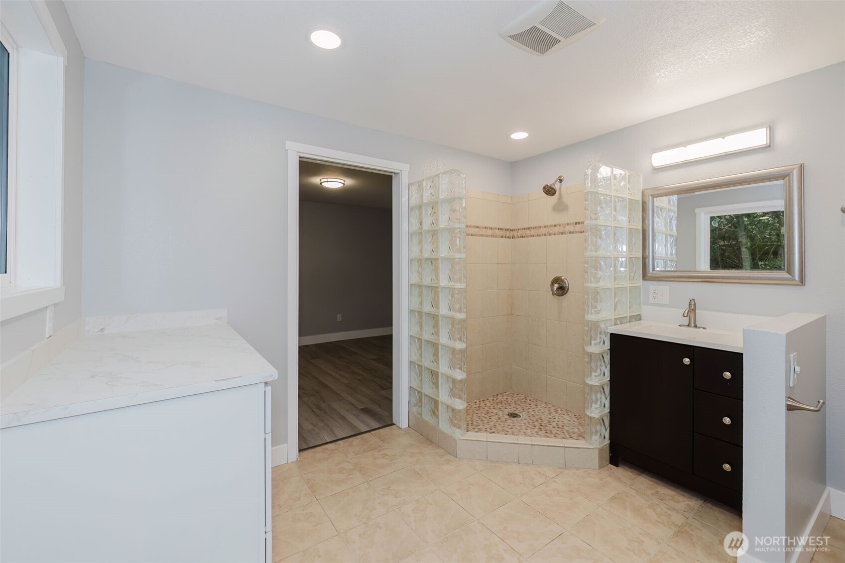 80 East Judy Lane Belfair, WA 98528 - Photo 33 of 40 a bathroom with a bathtub and a shower