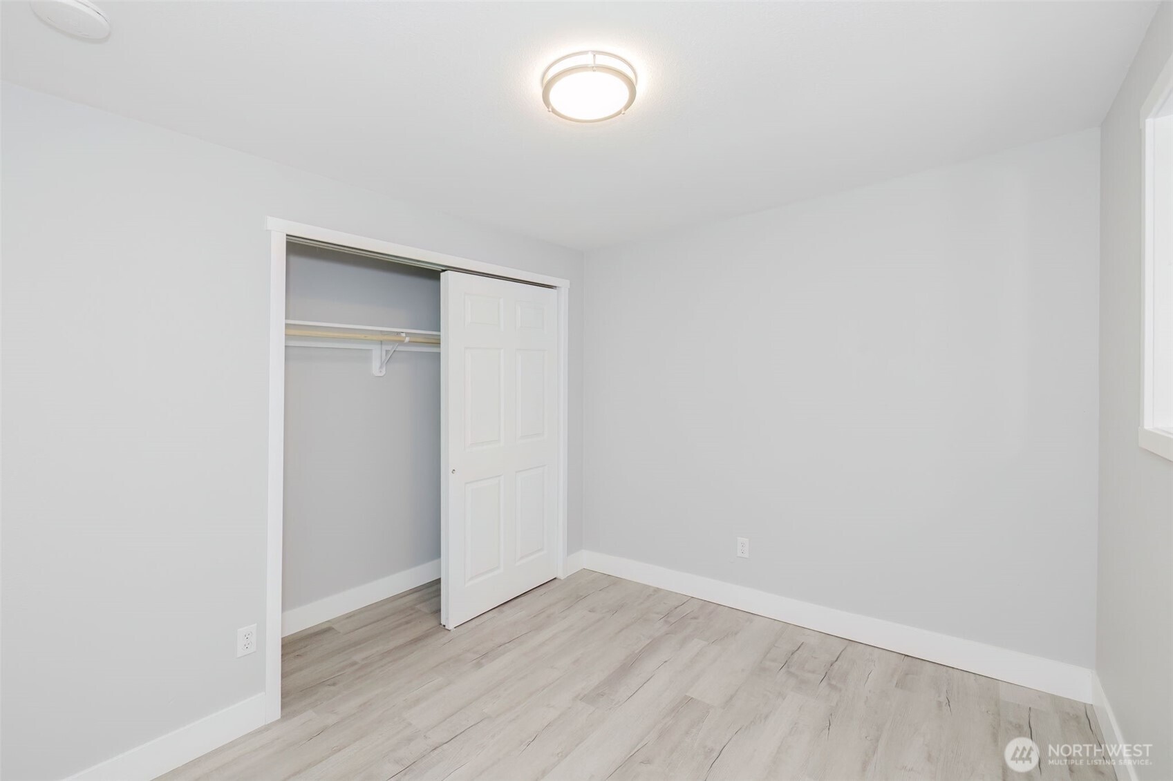 80 East Judy Lane Belfair, WA 98528 - Photo 39 of 40 a view of an empty room with wooden floor