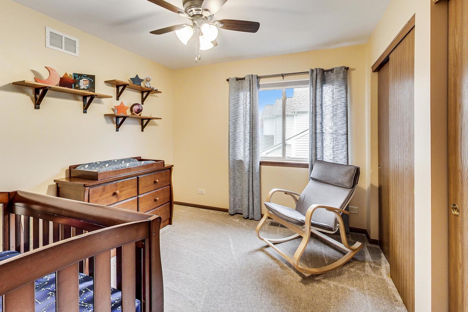 1174 Sweetwater Ridge Lake In The Hills, IL 60156 - Photo 24 of 44 a view of a livingroom with furniture and windows