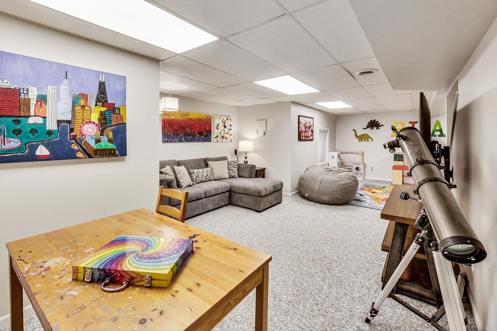 1174 Sweetwater Ridge Lake In The Hills, IL 60156 - Photo 32 of 44 a bedroom with furniture and a flat screen tv