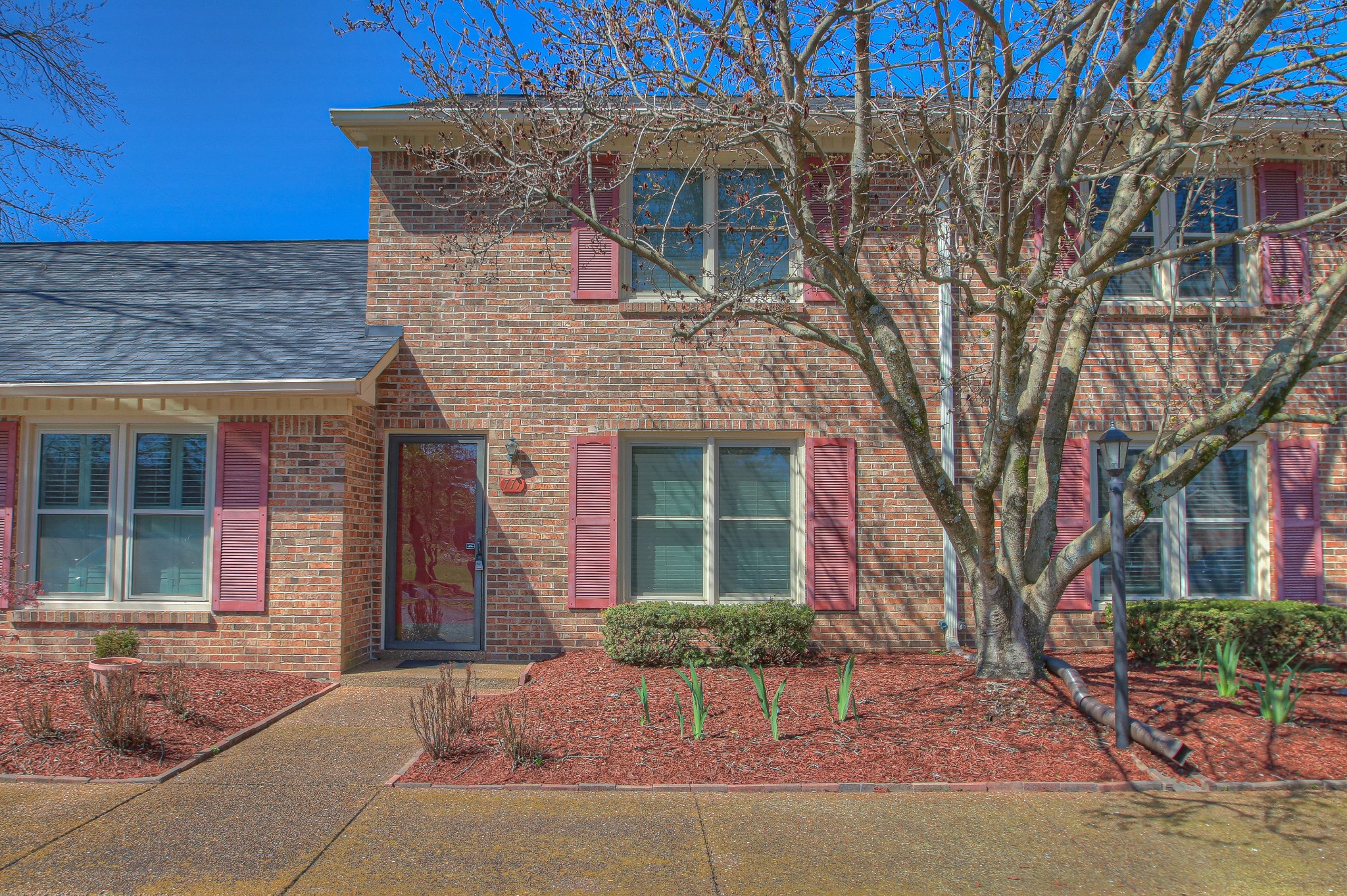 771 Kent Road Nashville, TN 37214 - Photo 2 of 34 a front view of a house with garden