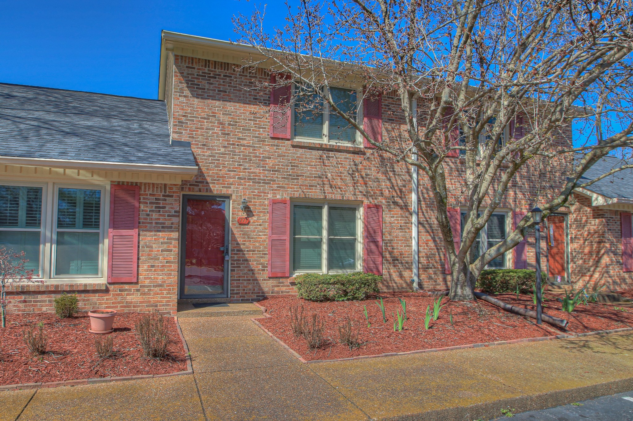 771 Kent Road Nashville, TN 37214 - Photo 3 of 34 a front view of a house with garden