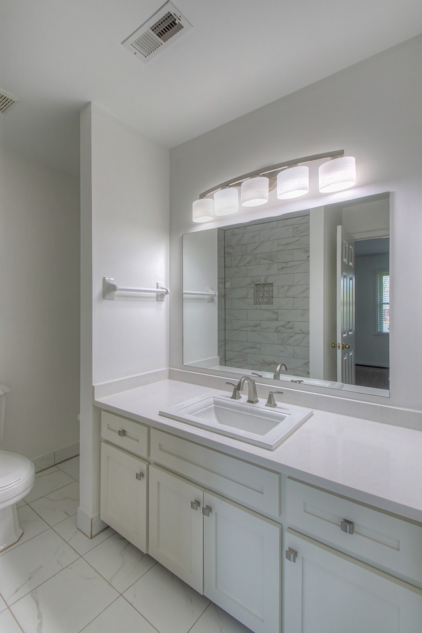 771 Kent Road Nashville, TN 37214 - Photo 32 of 34 a bathroom with a sink and a mirror