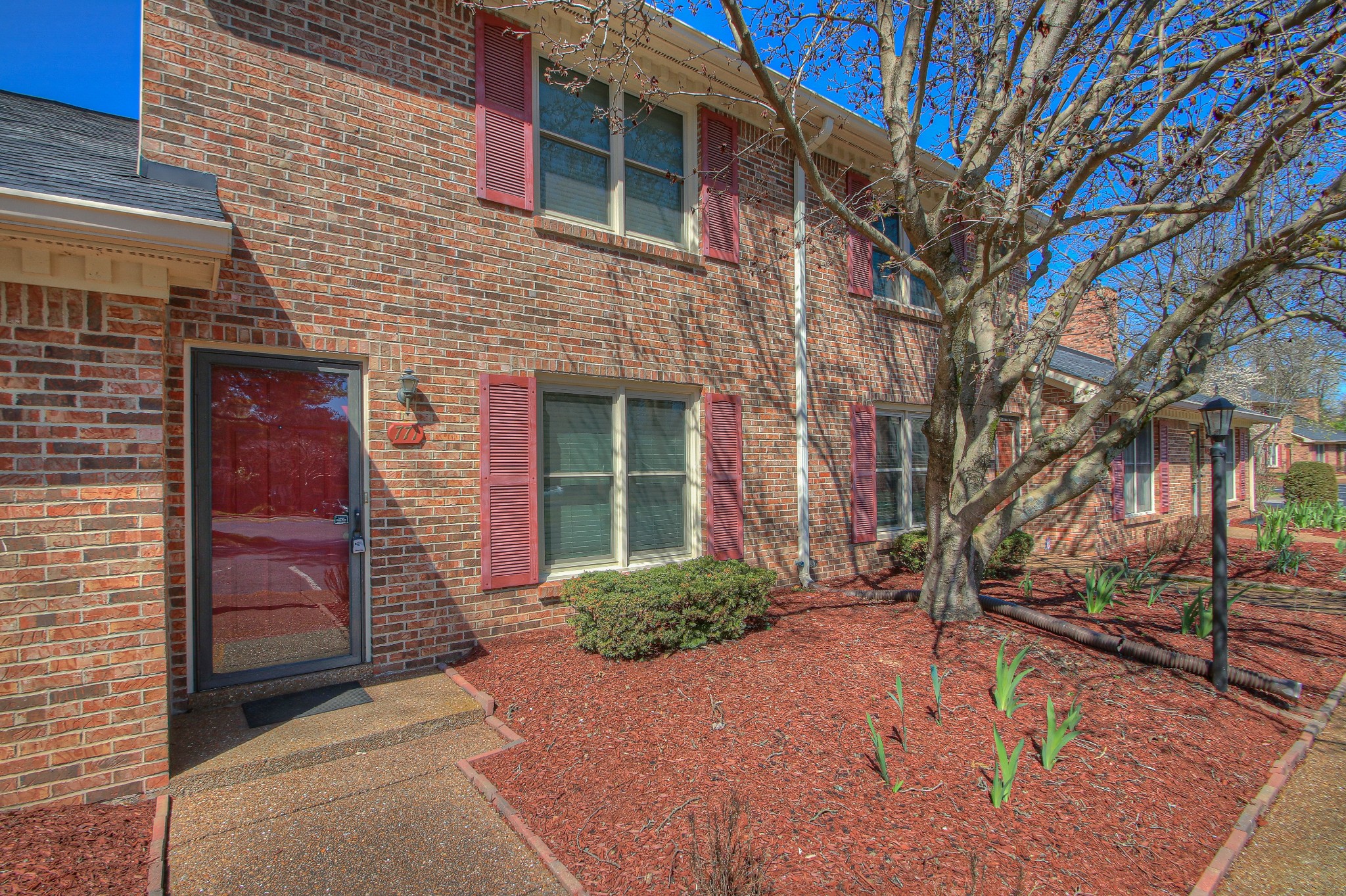 771 Kent Road Nashville, TN 37214 - Photo 5 of 34 a front view of a house with a yard