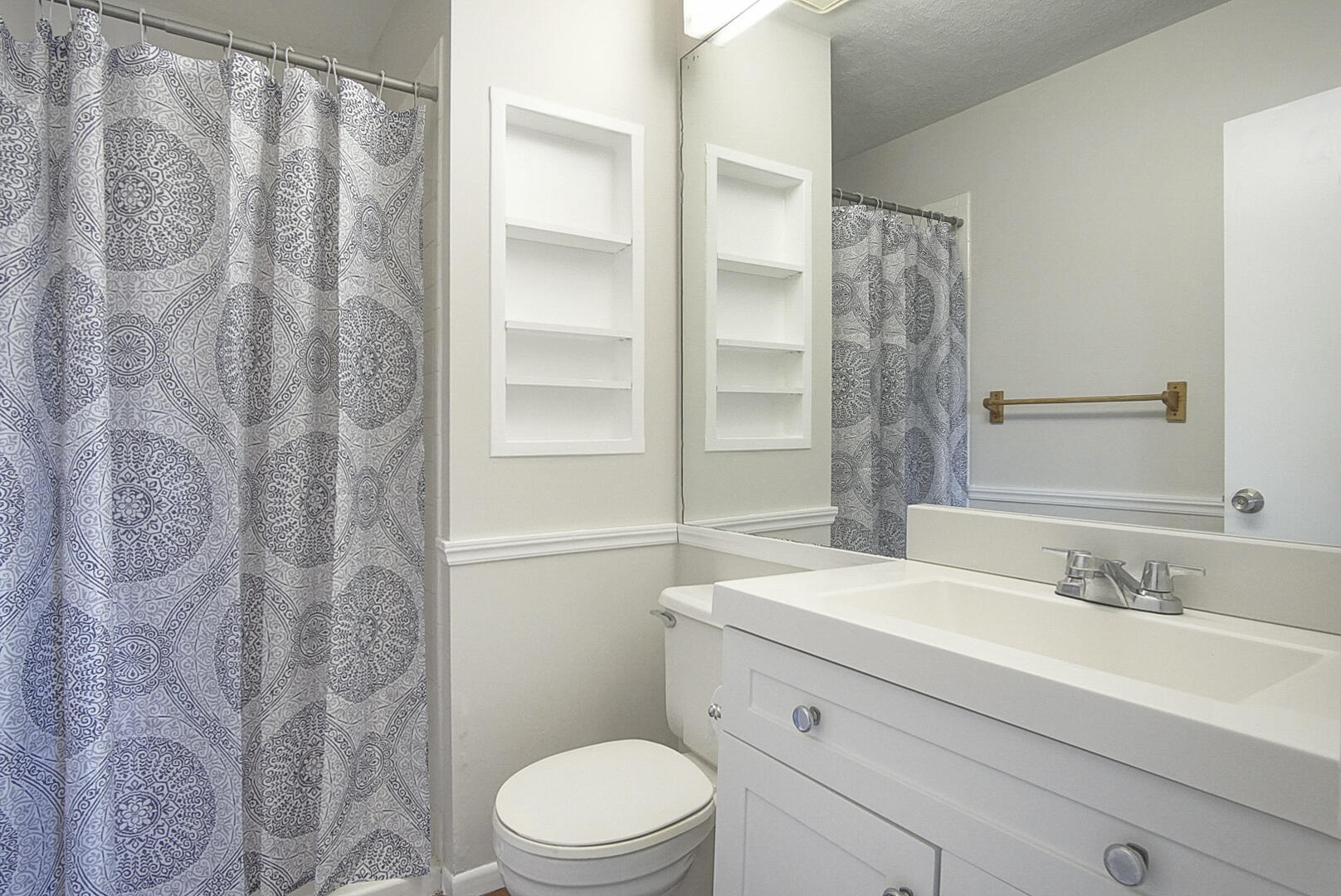 4206 Inlet Circle Greenacres, FL 33463 - Photo 17 of 30 a bathroom with a sink a toilet and shower