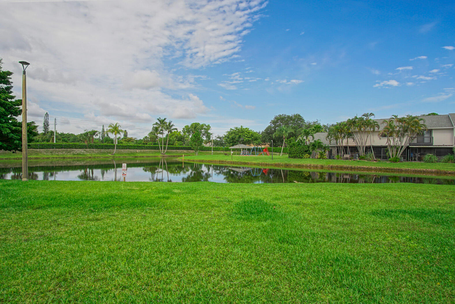 4206 Inlet Circle Greenacres, FL 33463 - Photo 20 of 30 a view of a park and a big yard