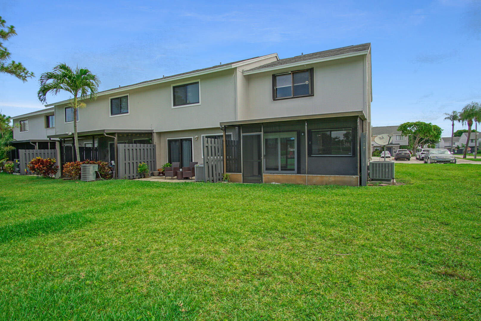 4206 Inlet Circle Greenacres, FL 33463 - Photo 21 of 30 a view of a house with a yard and sitting area